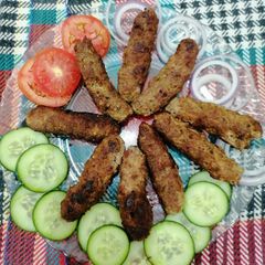 A picture of Seekh kabab in pan😉😋.