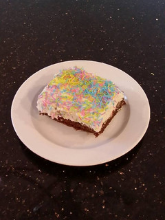 A picture of Fudge Brownies with White Chocolate Truffle Cream.