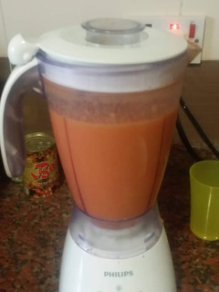 A picture of Tomatoes and Paw paw smoothie.