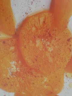 Una foto de Naranjas con aceite