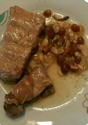 Foto principal de Costillas con pasas y almendras