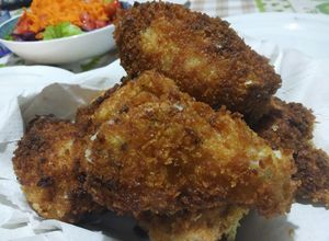 Una foto de Milanesas de alitas con panko