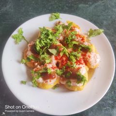 Dahi vada (white udad dal) A picture of Dahi vada (white udad dal).