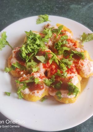 A picture of Dahi vada (white udad dal).