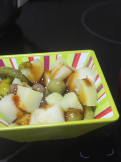 Una foto de Ensalada de melón con patata y encurtidos
