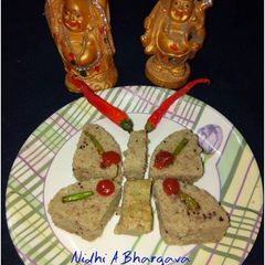 A picture of Butterfly sprouts dhokla cooked in mug.