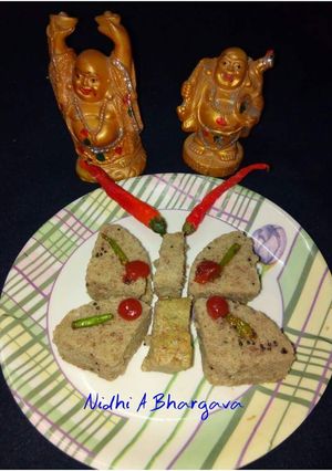 A picture of Butterfly sprouts dhokla cooked in mug.