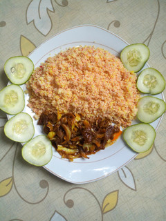 A picture of Couscous with pomo sauce.