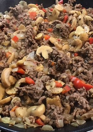 A picture of Ground Beef with Button Mushrooms, Red Bell Peppers, and Indian Spices.