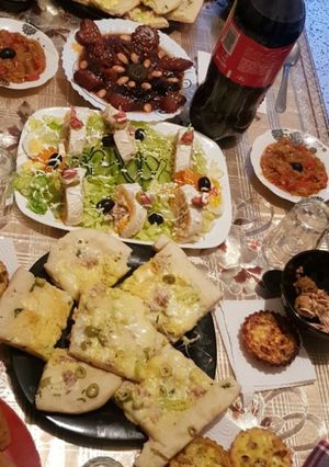 صورة لوصفة بيتزا بوازي يمي يمي😋😋