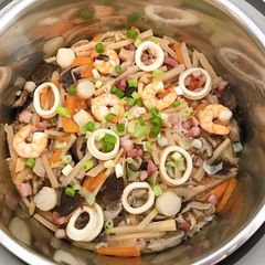 A picture of Bacon, seafood bamboo seasoned rice.