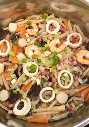 A picture of Bacon, seafood bamboo seasoned rice.