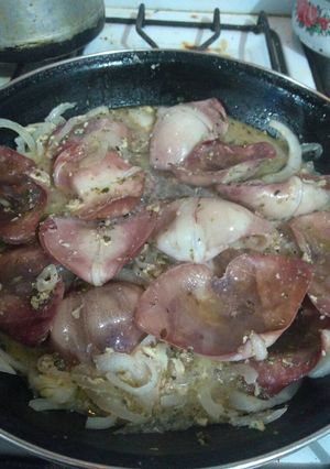 Una foto de Aletas de calamar con arroz