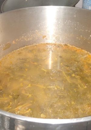 Una foto de Carne de puerco con Verdolagas en salsa mixta