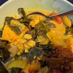 A picture of Coconut tamarind fish stew.