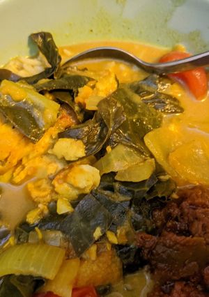 A picture of Coconut tamarind fish stew.