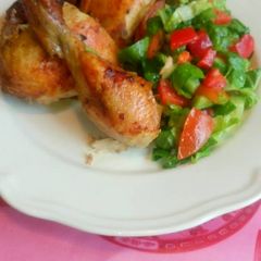 A picture of Oven roast chicken and salad.