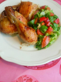 A picture of Oven roast chicken and salad.