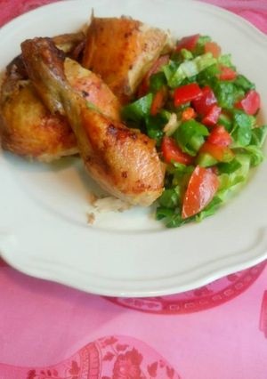 A picture of Oven roast chicken and salad.