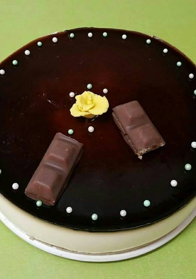 Una foto de Mousse de orujo y cobertura de licor de cafe