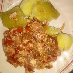 A picture of Sweet potatoes with egg sauce.