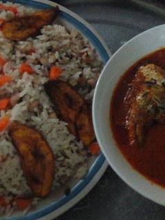 A picture of Rice,beans, plantain and fish stew.