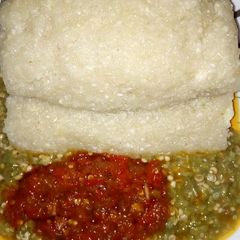 A picture of Garri(Eba) with okro and stew.