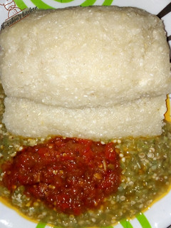 A picture of Garri(Eba) with okro and stew.