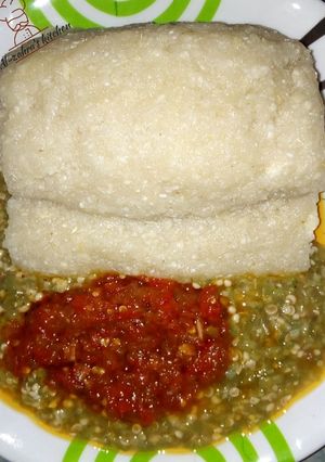 A picture of Garri(Eba) with okro and stew.