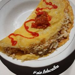 A picture of Nasi Goreng Mawut in Omurice Style.