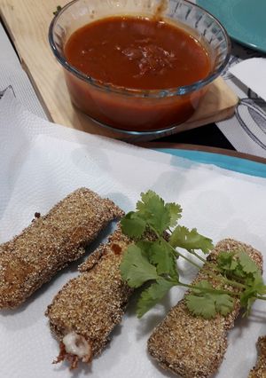Una foto de Bastones de muzzarella sin tacc