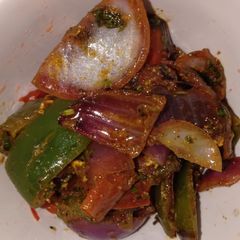A picture of Capsicum and onion veg.