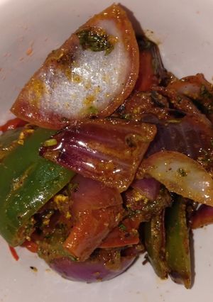 A picture of Capsicum and onion veg.
