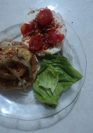 Una foto de Bocadillo de nugget  gratinados de pollo y chile en polvo a la mexicana el geras. México