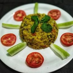 A picture of Oats and daliya Mix Veg Khichdi.