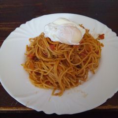 A picture of Spaghetti with poached egg.