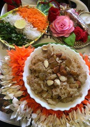 A picture of Coconut rice with tricolour Salad.