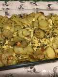 Gratin de pommes de terre façon truffade à la tome fraîche,ail mariné et persil