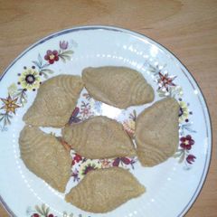 A picture of Nolen gurer sondesh (Date palm jaggery sweet meat).