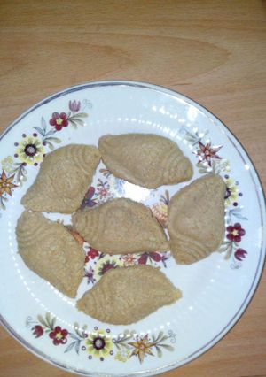 A picture of Nolen gurer sondesh (Date palm jaggery sweet meat).