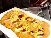 Una foto di carbonara con guanciale