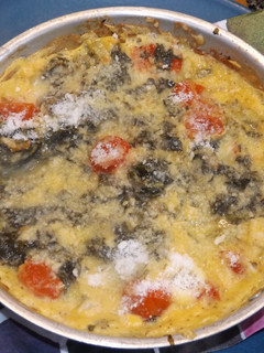Una foto de Fritatta de grelos y tomatitos