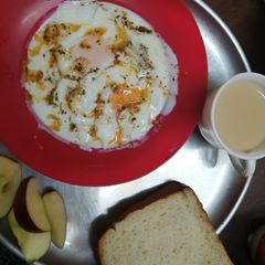 A picture of Turkish style: poached eggs with yogurt.