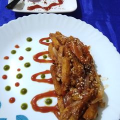 A picture of Honey Chilli Potatoes.