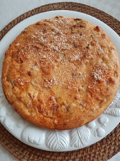 Foto di Torta salata prosciutto cotto pomodori secchi e briee