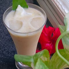 A picture of Red Banana & Apple Milkshake – Kesar Elaichi Delight.