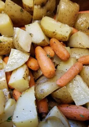 A picture of Oven-roasted Potatoes and Carrots with Thyme.