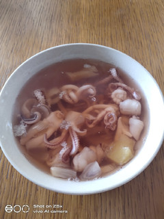 A picture of Squid Head and Tentacles in Soup.