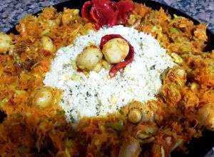 Una foto de Cous cous con champiñones y vegetales