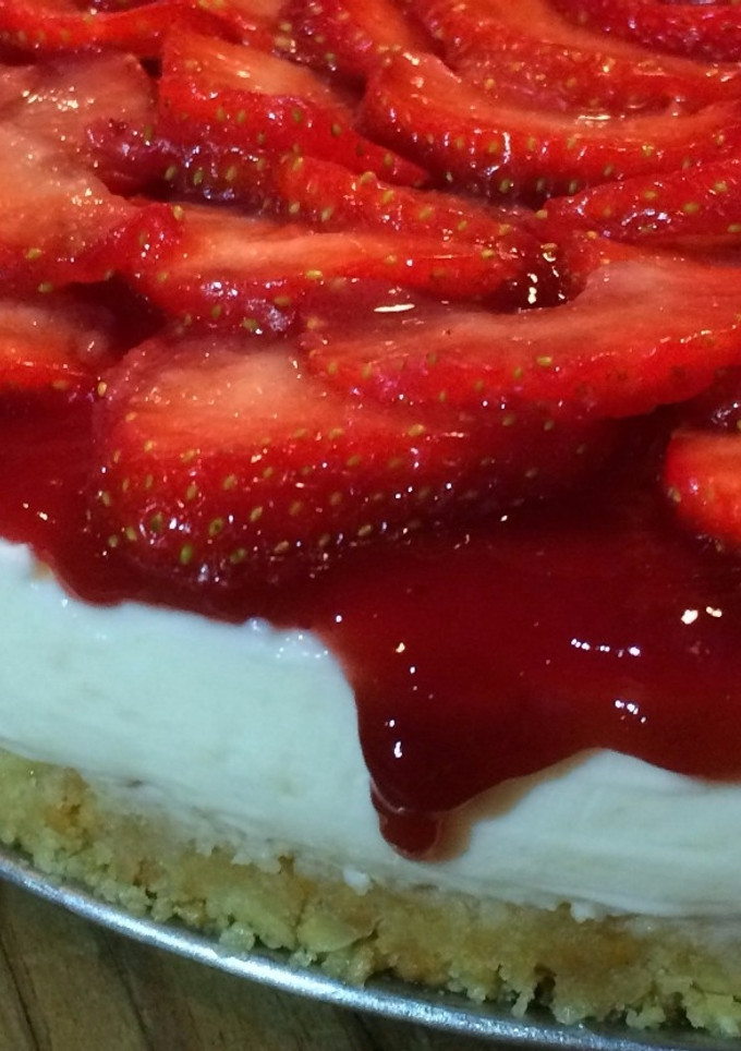 Una foto de Tarta de queso con mermelada de fresa